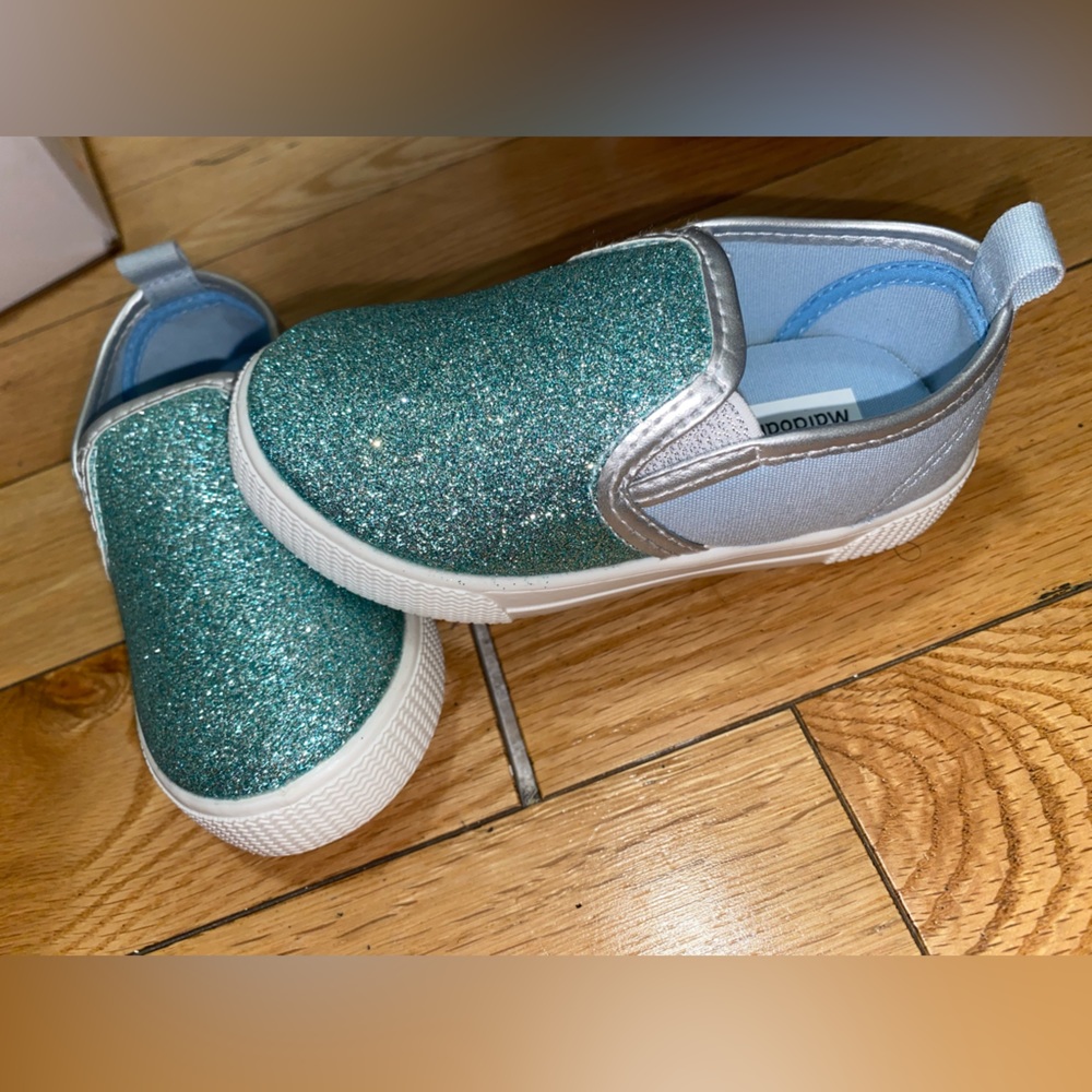 Blue sparkly slip on shoes